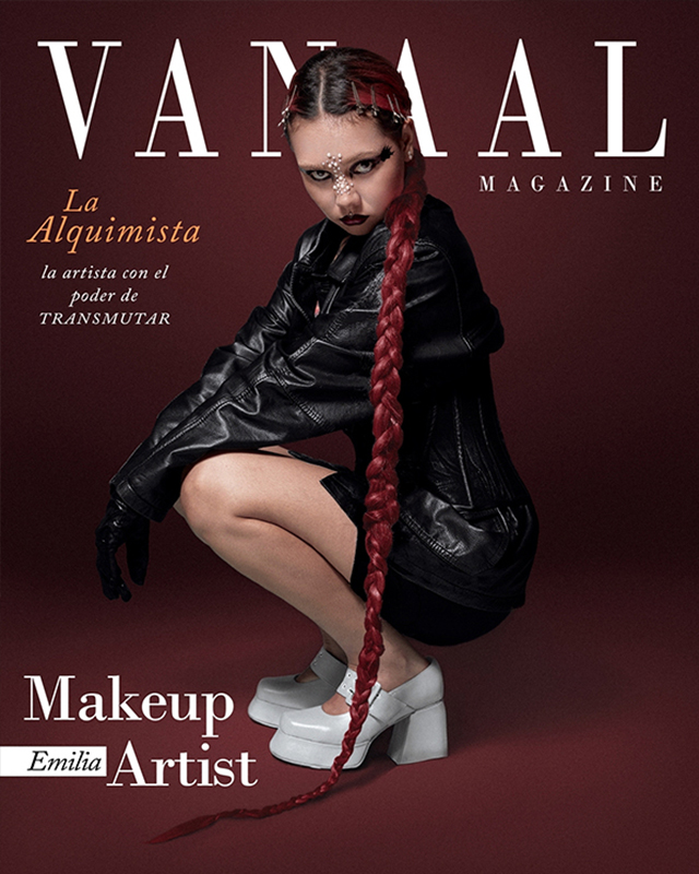 Black and white photograph of a nun in front of a giant window, holding a candle, surrounded by butterflies.